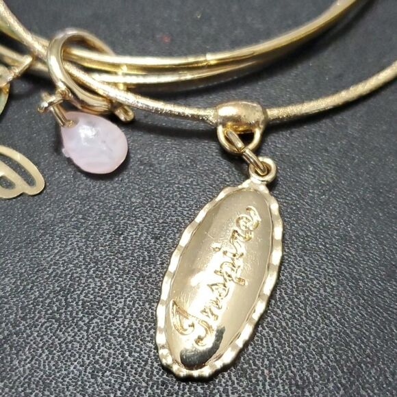 Gold tone layered bracelet with charms - Picture 4 of 9